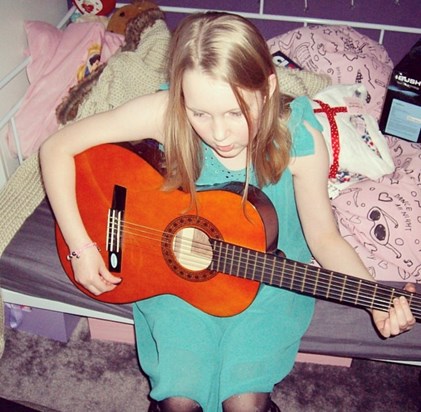 Learning to play guitar xx