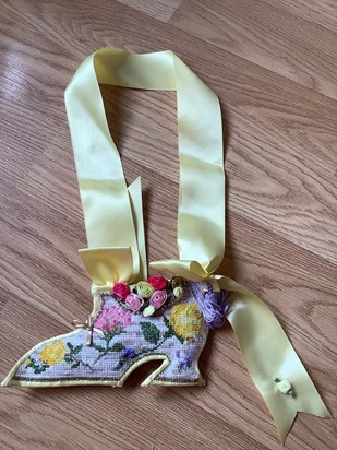 My mother made this shoe for my wedding to Ken (for luck) there are beads on this as well as the little silk roses. 