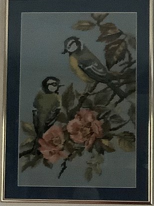 Mummy made this tapestry of blue tits. Her father, Grandad, loved the little birds.