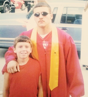 With his big brother on graduation day.