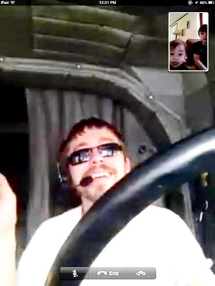 Facetime with his sons while on the road.