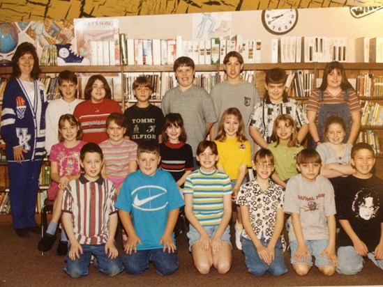 Runyon Grade School...he is on the bottom row, far right. Can't miss the grin!