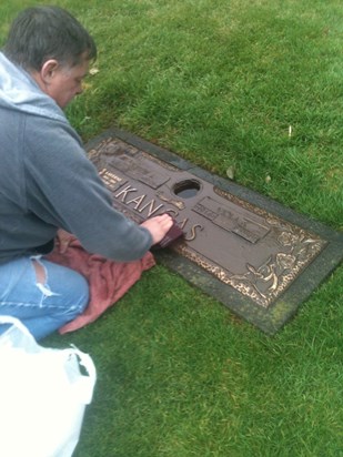 Tom taking care of Mom and Andy's gravesite