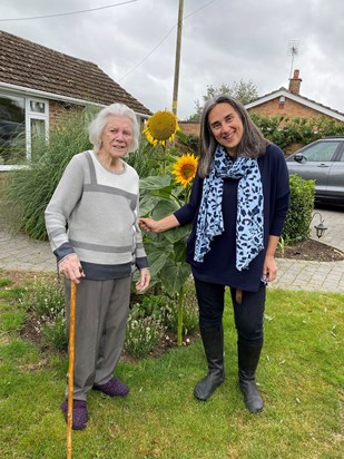 Hilda showing Rebecca her sunflowers  Autumn 21 