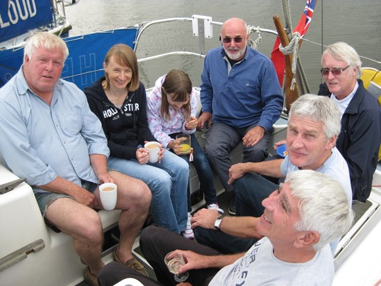 Happy gathering on Bob's boat, July 2012.  Ian, Tracy & her daughter, Chas, Mike, Terry, Bob.