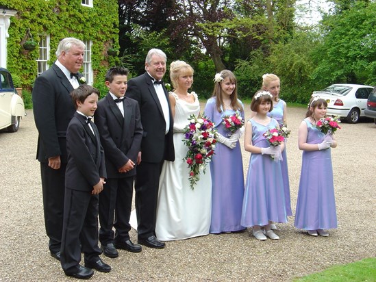 Another picture from Bob & Lesley's wedding in 2004. Out of chinos and into a suit!