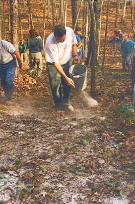 Andy tossing gypsum at Wild Harvest Sector workshop 2000
