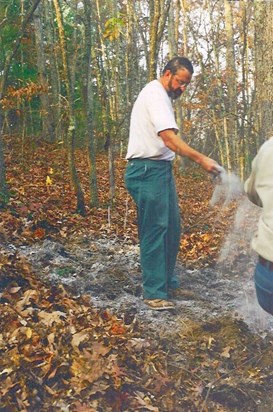 Andy tossing lime onto goldenseal - Wild Harvest Sector - 2000