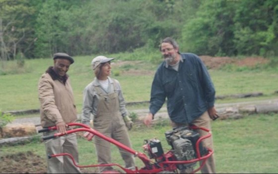 Tadese Mebrahtu, Patricia of Epic Gardens & Andy getting the edamame bed ready, 2006.