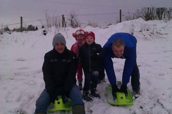 having fun in the snow with Amy, Luke and Richard