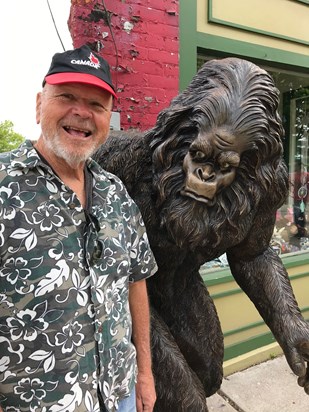 Steve with bigfoot statue near Soo Locks in Michigan.