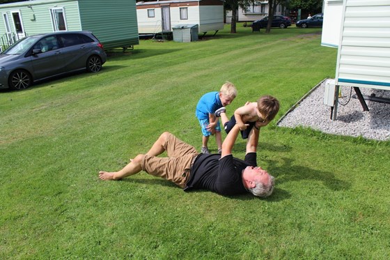 Oliver and William play fighting grandad