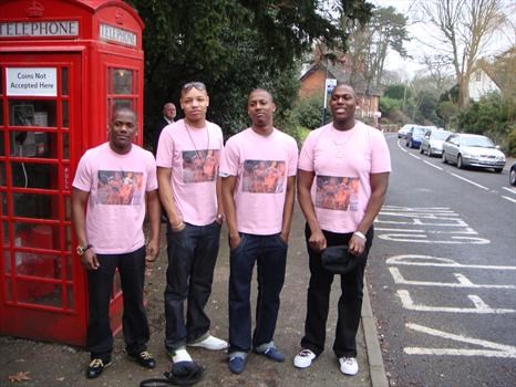 Boys in pink T- shirts with pv's pic on.