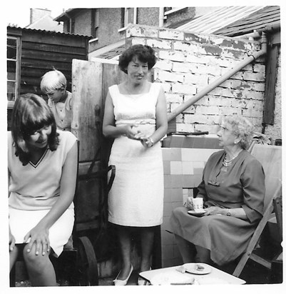 Me, Trevor next door, Jo and Nanny Perry at 68 Gloucester Road, Littlehampton, 1964