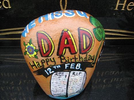 A stone I painted for my dads birthday.
