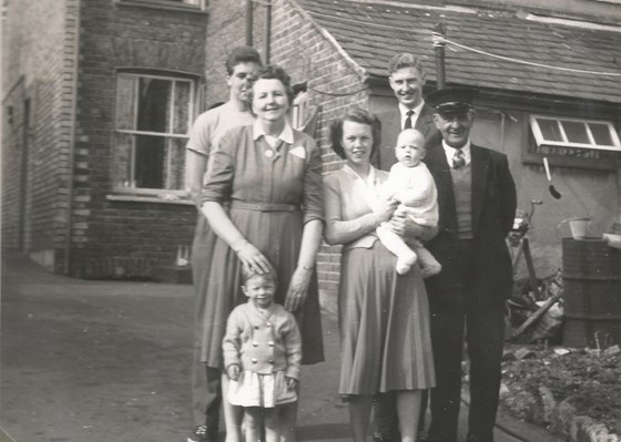 Jean with parents, brothers and children