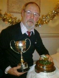 Dad many years ago, with 1 of his many fishing trophies.. not sure if this was before Mum died or after