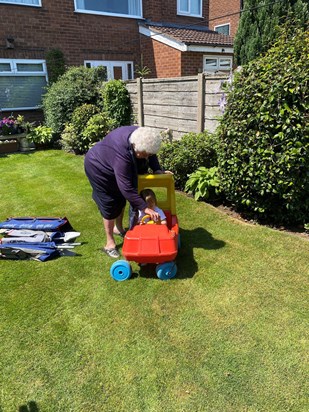 Bobi playing with his great gran