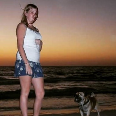 Alyssa at Bradenton Beach with our dog Smoke