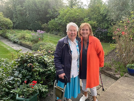 Elizabeth with Barbara Elliott (ex Headmistress of Channing School), in her garden, late 2023