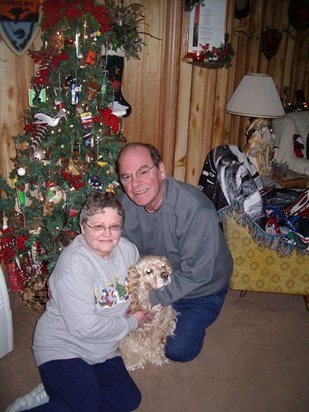 mom , dad and their grandpuppy Meeko at Christmas 2007