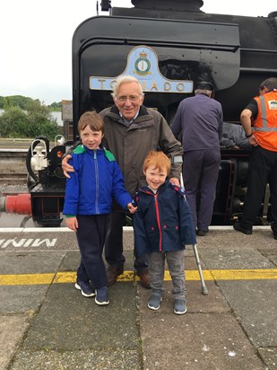 Happy Grandpa with some of his greatest loves; his grandsons and a steam train! 