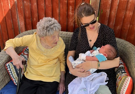 Meeting her youngest great grandson, Theo 