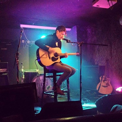 Charlie playing an acoustic gig in Worthing