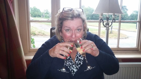 AnneMarie enjoying “a” glass of Prosecco, on a holiday to the Lake District.
