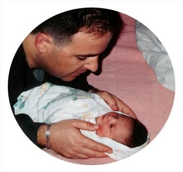 Daddy with newborn Emily   1998