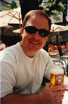 Curt drinking a beer in Europesm