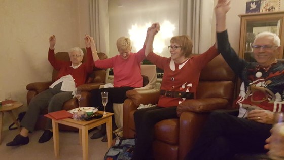 Christmas after a few Snowballs! Midge with Margaret, Carole and Steve.