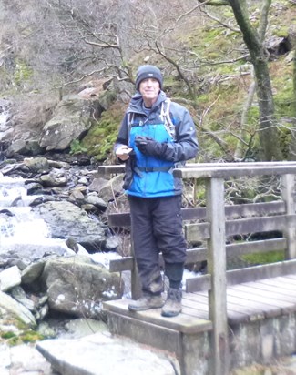 Andrew walking in the Lake District Fells he loved.