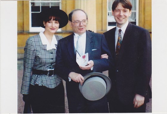 Gerald Isaaman with OBE 1994