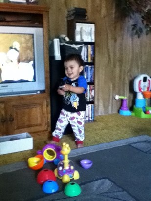 Nick playing with his toys