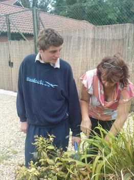 matthew planting plant on the 17/6/09 in memory of grandad who died 17/06/1997