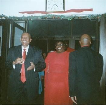 Carletta escorting our Pastor in for his Pastoral Anniversary