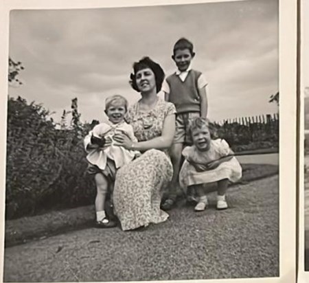 Julia as a little girl with her mum, Robert and Rick 