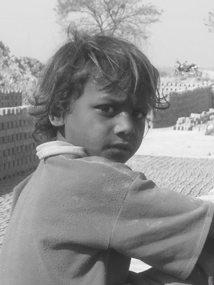 A child worker at a brick kiln (photo taken by Arup on 23 Jan 2010)