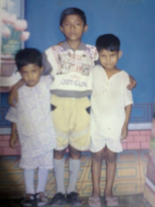 Arup (middle) with brother (left) & a cousin (right)