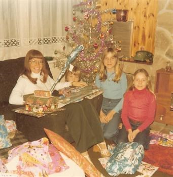Christmas Day 1977 -Auntie Pat with all her Christmas presents