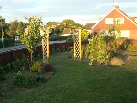 Jill's garden at sunset, created in memory of Paul