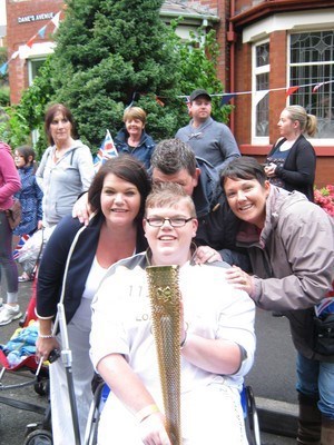Alex carrying the Olympic torch