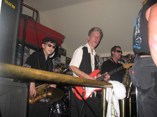 Eric playing sax at my 50th birthday party in 2006