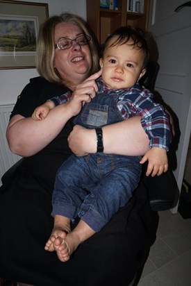 Jan holding Joshua at his first birthday party in October 2018