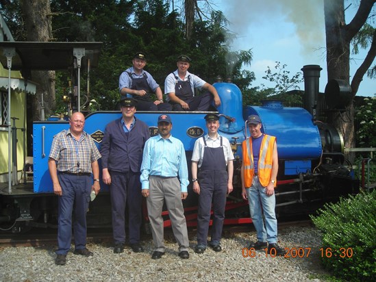 Adrian with his team on the back drop of fully functional century old B class Steam Locomotive. UK-2007