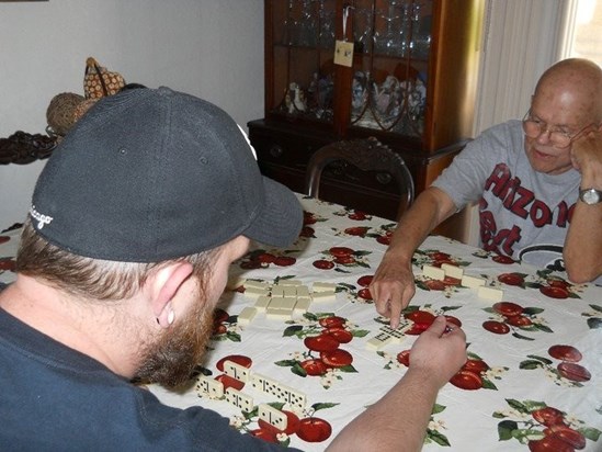 Dad playing dominos