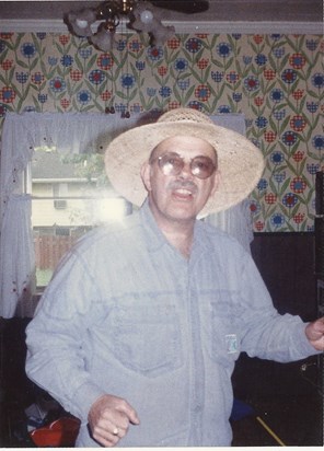 Moving Day at 222 North Hazelton--Dad dancing with Mom's hat