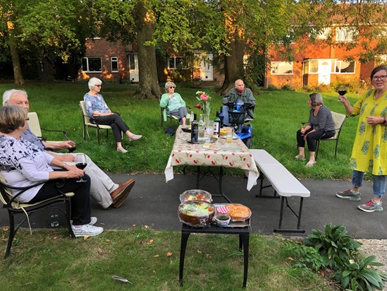 Paddy and Pat enjoying safe social distance social with the neighbours.