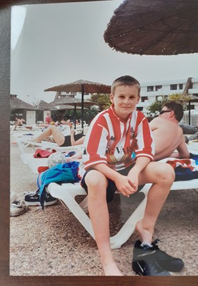 Special memories although can't believe we let him wear that football shirt when on holiday with us!